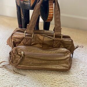 Andrew Marc gold travel bag